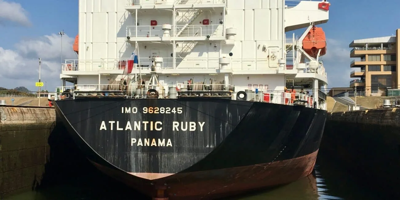 Container ship sailing through the Panama Canal.