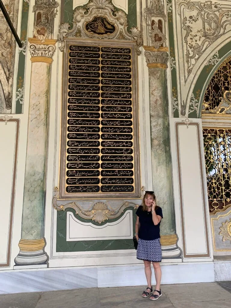 Listening to the audio system while touring Topaki Palace