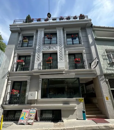 Obanhan Hotel Istanbul. 3-story building with flower boxes and a roof terrace.
