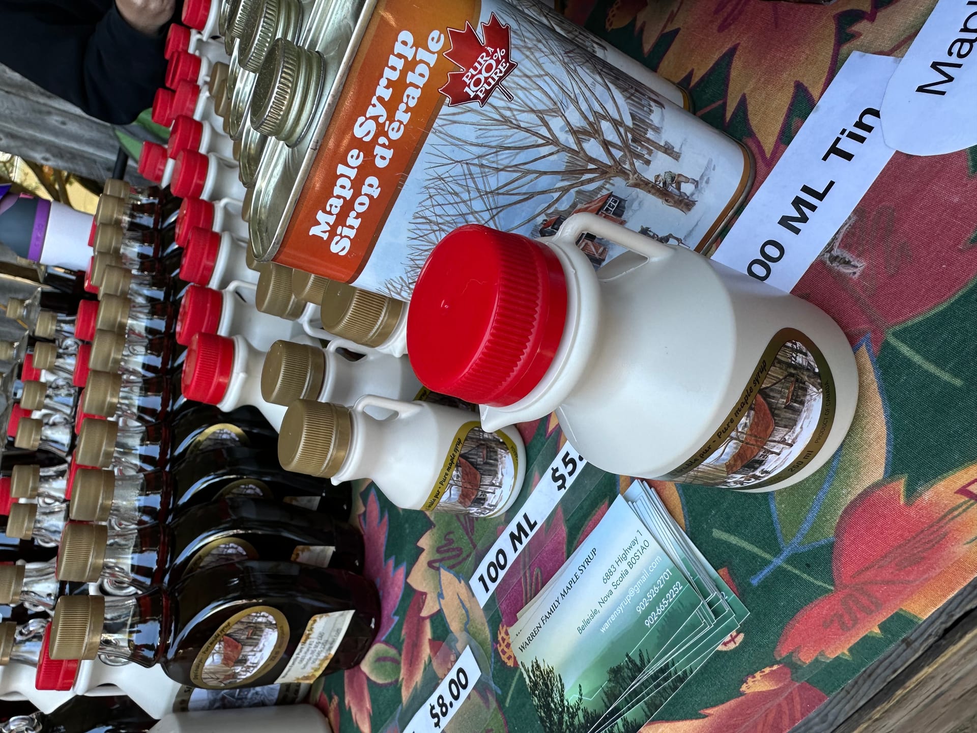 Maple syrup stall at the Annapolis Royal farmers market, Nova Scotia
