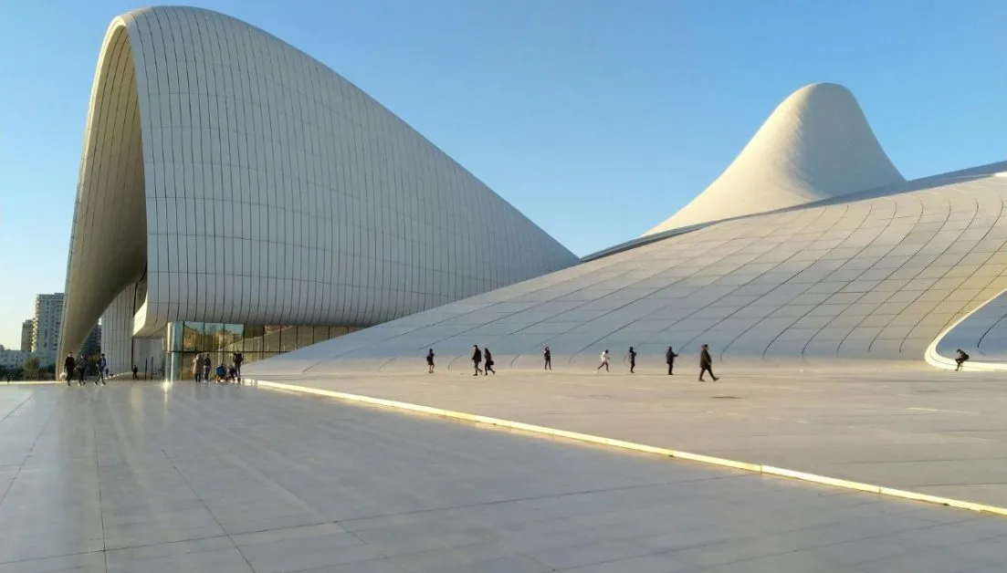 The white futuristic design that is Heydar Aliyev Center in Baku Azerbaijan. This facility is one of the reasons to visit Azerbaijan and hosting many global events.