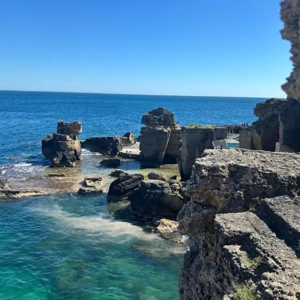 Rocky cliffs and turquoise sea on the Salento coast, Puglia