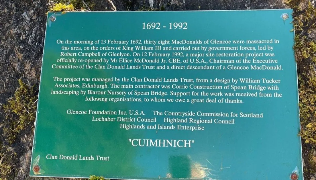 Plaque in memory of a massacre in 1692 in Glencoe Scotland.