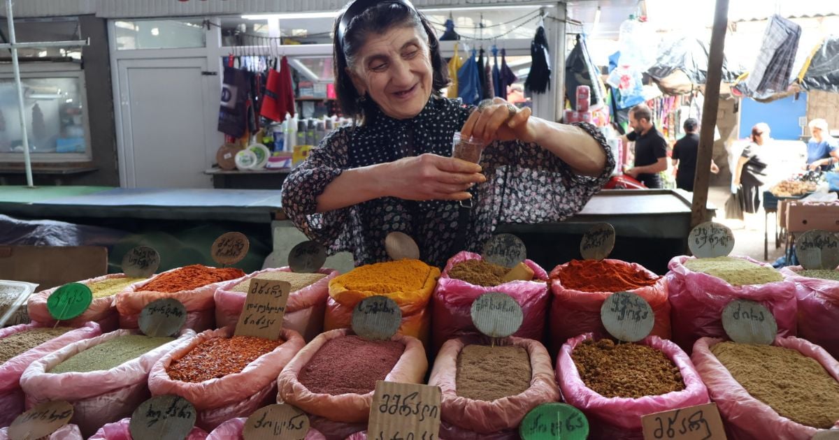 Close-up of dried peppers and spices at a vibrant market stall
