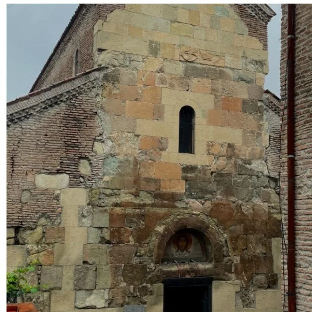 Stone exterior and entrance of the ancient Anchiskhati Church in Old Town Tbilisi.
