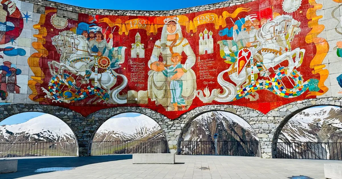 Large fresco with multicolored images depicting friendship between Georgia and neighboring country Russia.