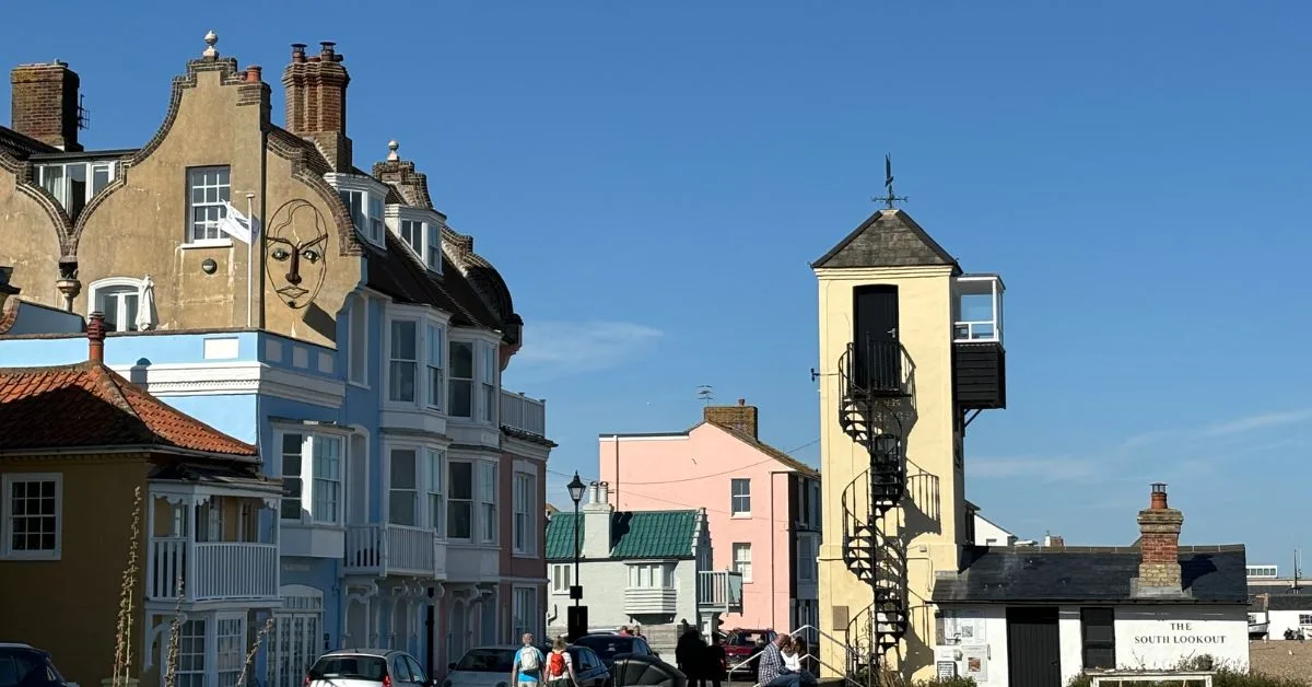 Buildings in Aldeburgh which have been converted into places for artists. One is a tower and the other a blue building.