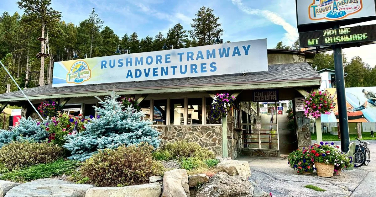 Small building which is entrance to Rushmore Tramway where tourists can enjoy many unique things to do in Black Hills.