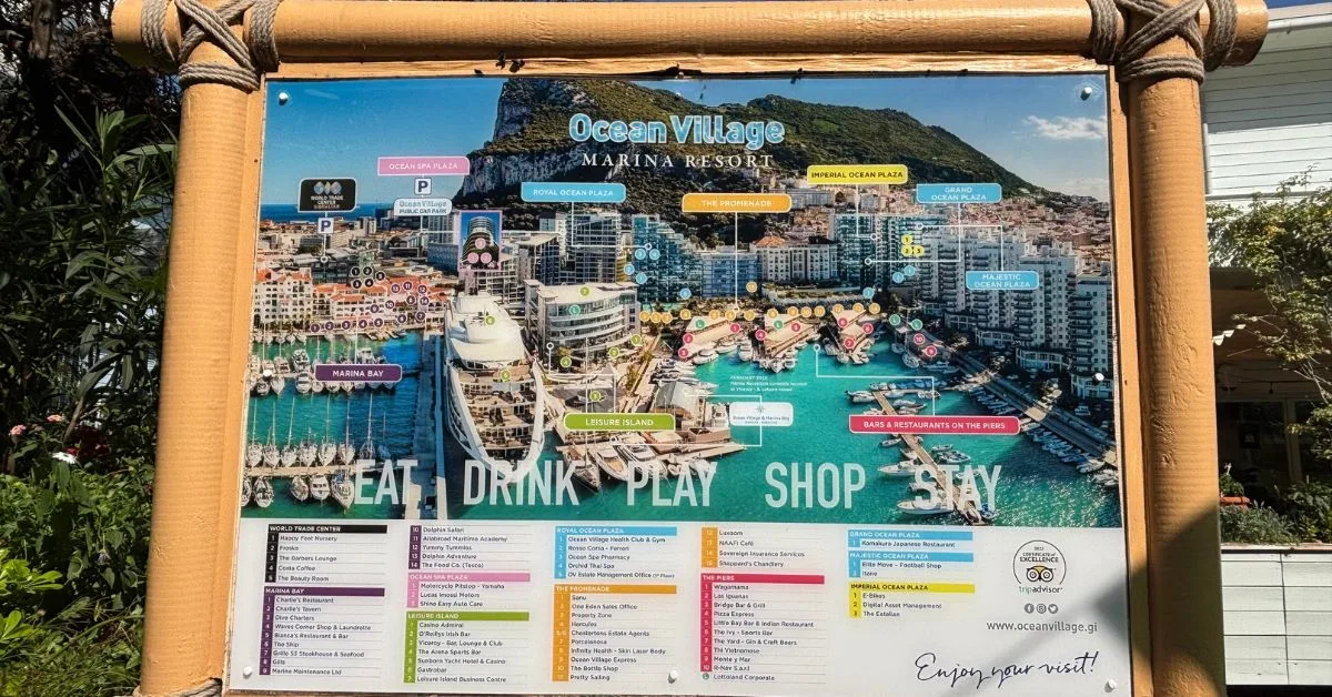 Signage showing where to eat, drink, play, shop and stay in Ocean Village Resort in Gibraltar