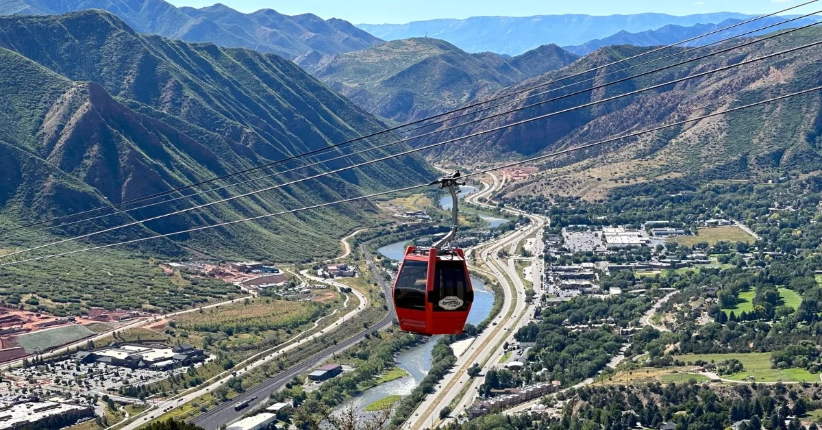 A gondola above Glenwood Springs town connecting visitors to the Adventure Park Amusement Area.