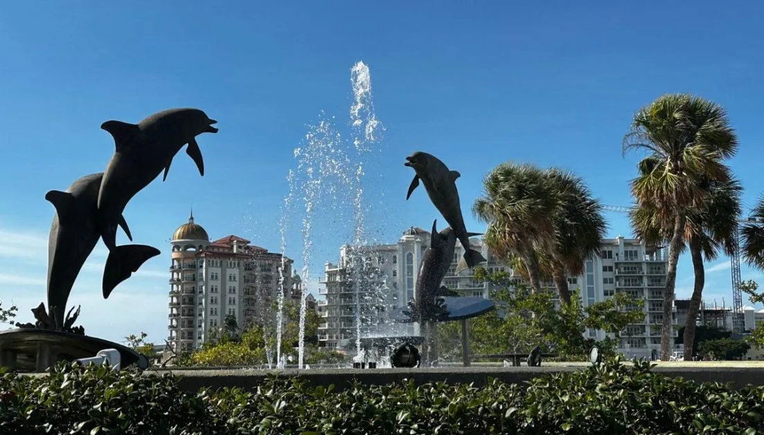Bayfront Park, Sarasota has a fountain with 4 dolphin statues mid air. Strolling in this park is a fantastic way to enjoy an evening in Sarasota.