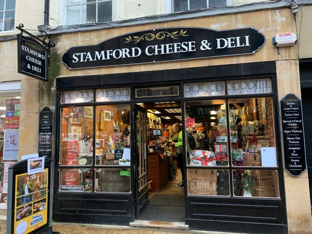 A cheese shop in Stamford England window display.