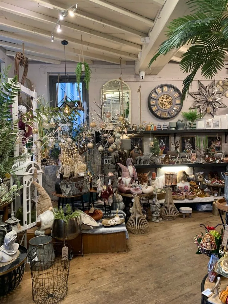 Interior of a shop selling local crafts and Christmas decor.
