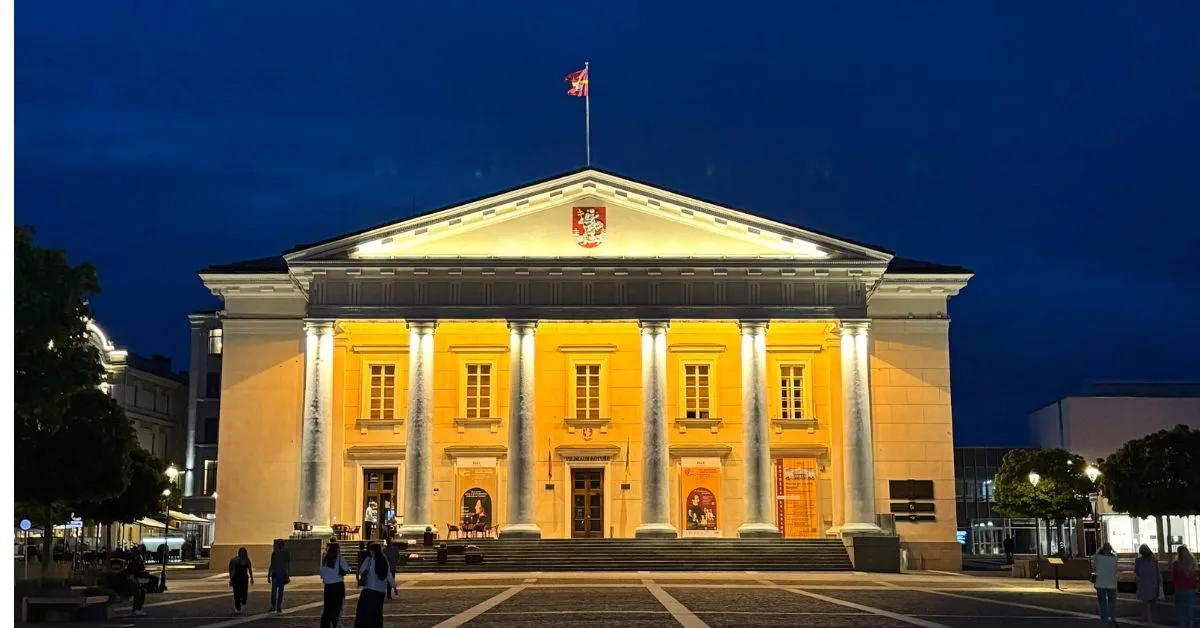 Town Hall lit up at night in Vilnius