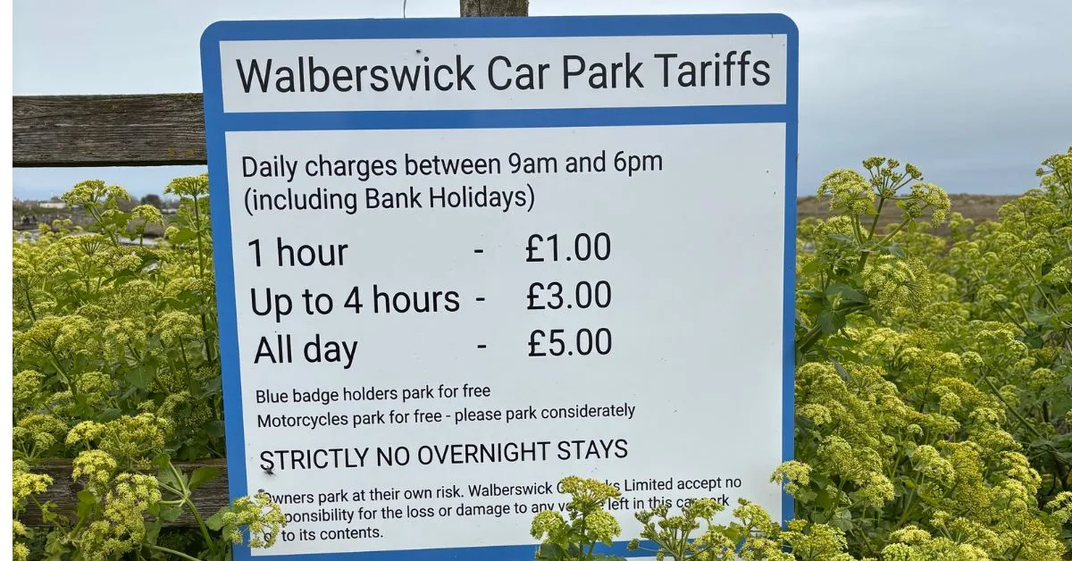 Sign showing the car parking charges for Walberswick