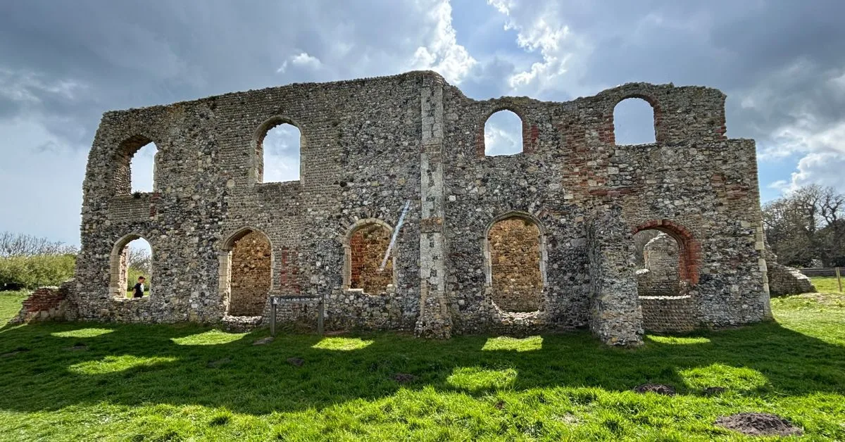 Part of the Greyfriars Priory near Walberswick the church ruins show arched windows and doorways set on a grassy field
