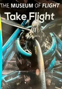 A jet engine advertising a museum. The propellers and engine case are visible.