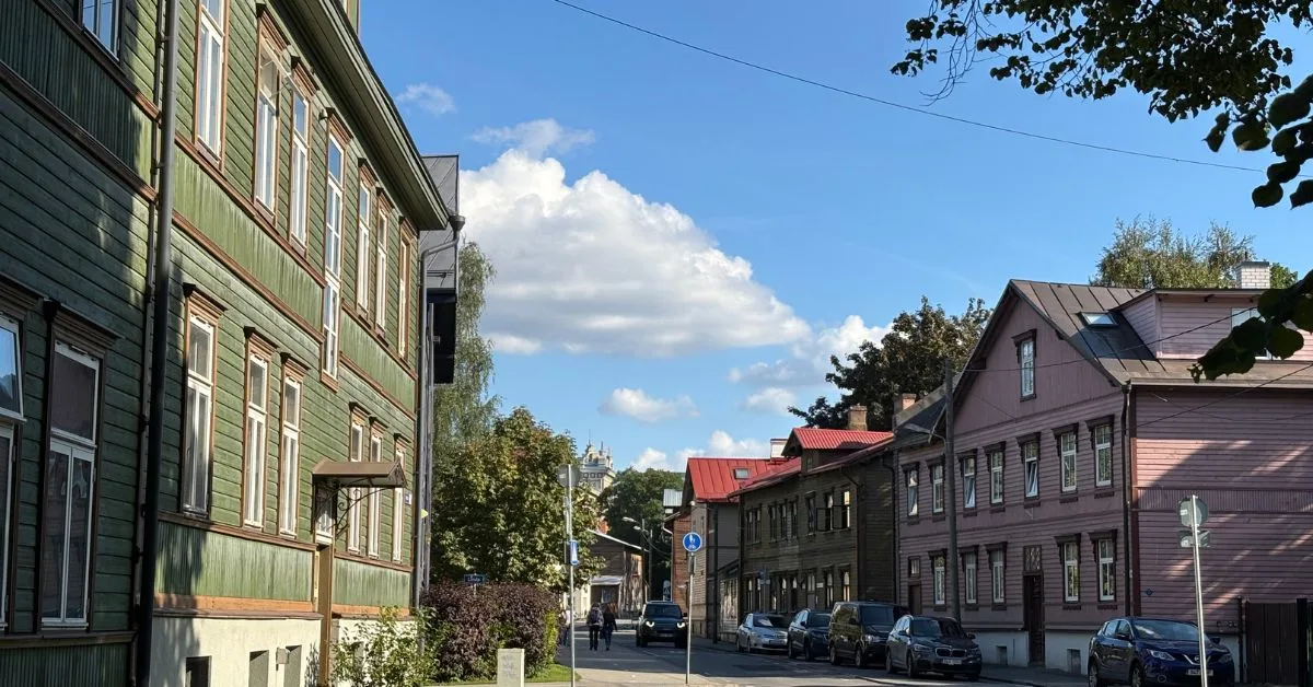 Row of different coloured wooden houses in a street