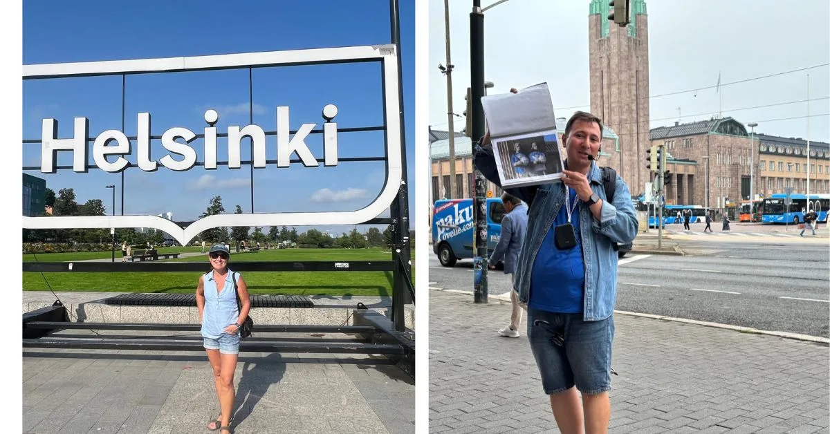 Woman standing under a sign saying Helsinki and a tour guide holding up a image