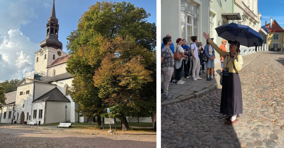 Large white church and guide with parasol explaining to a group about the area