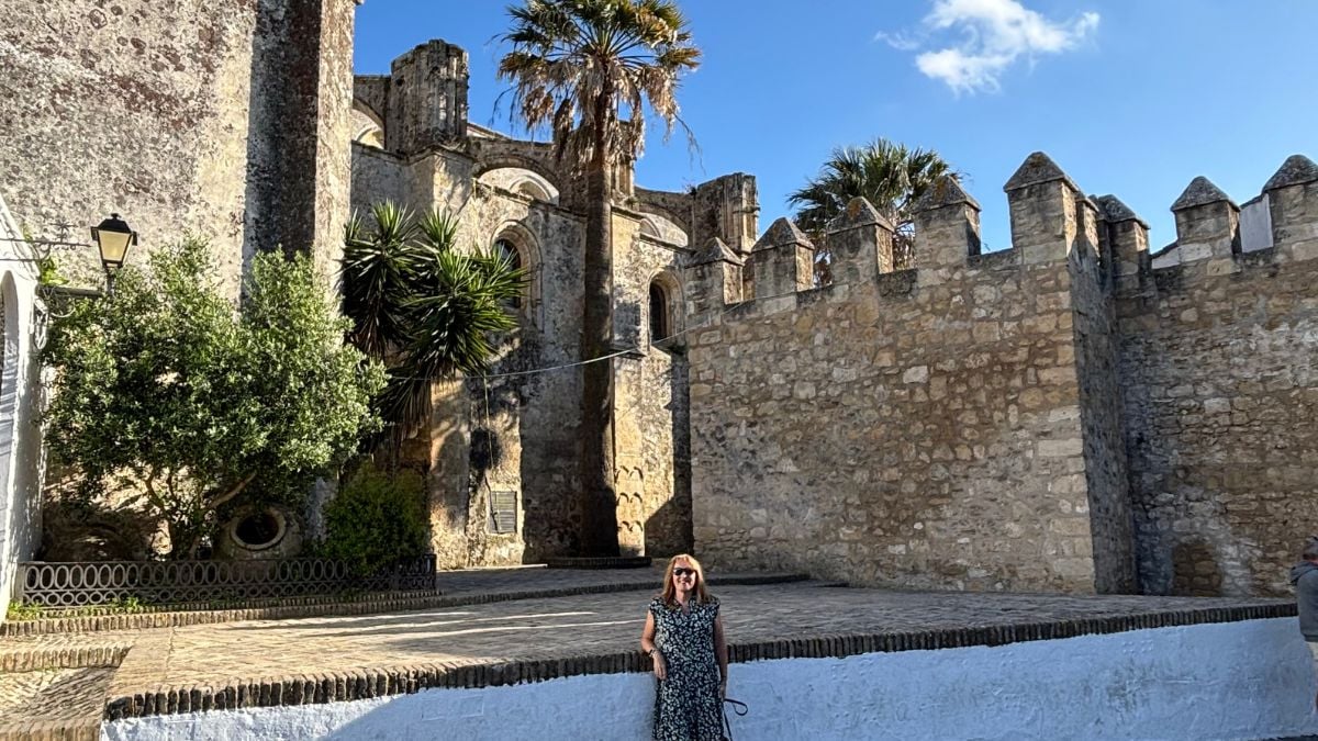 Castillo de Vejer medieval fortress with stone walls and battlements overlooking the white village