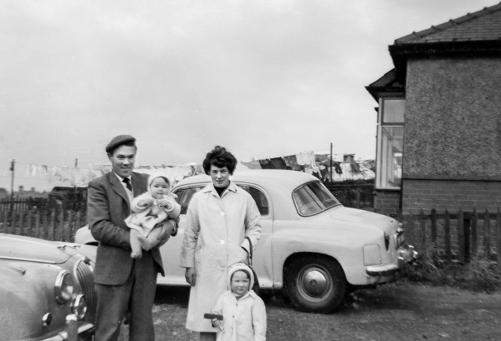 Family by the car