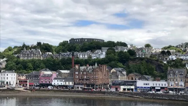 Oban - a coastal town on western Scotland with a small harbour and a Main Street of shops and restaurants in views.