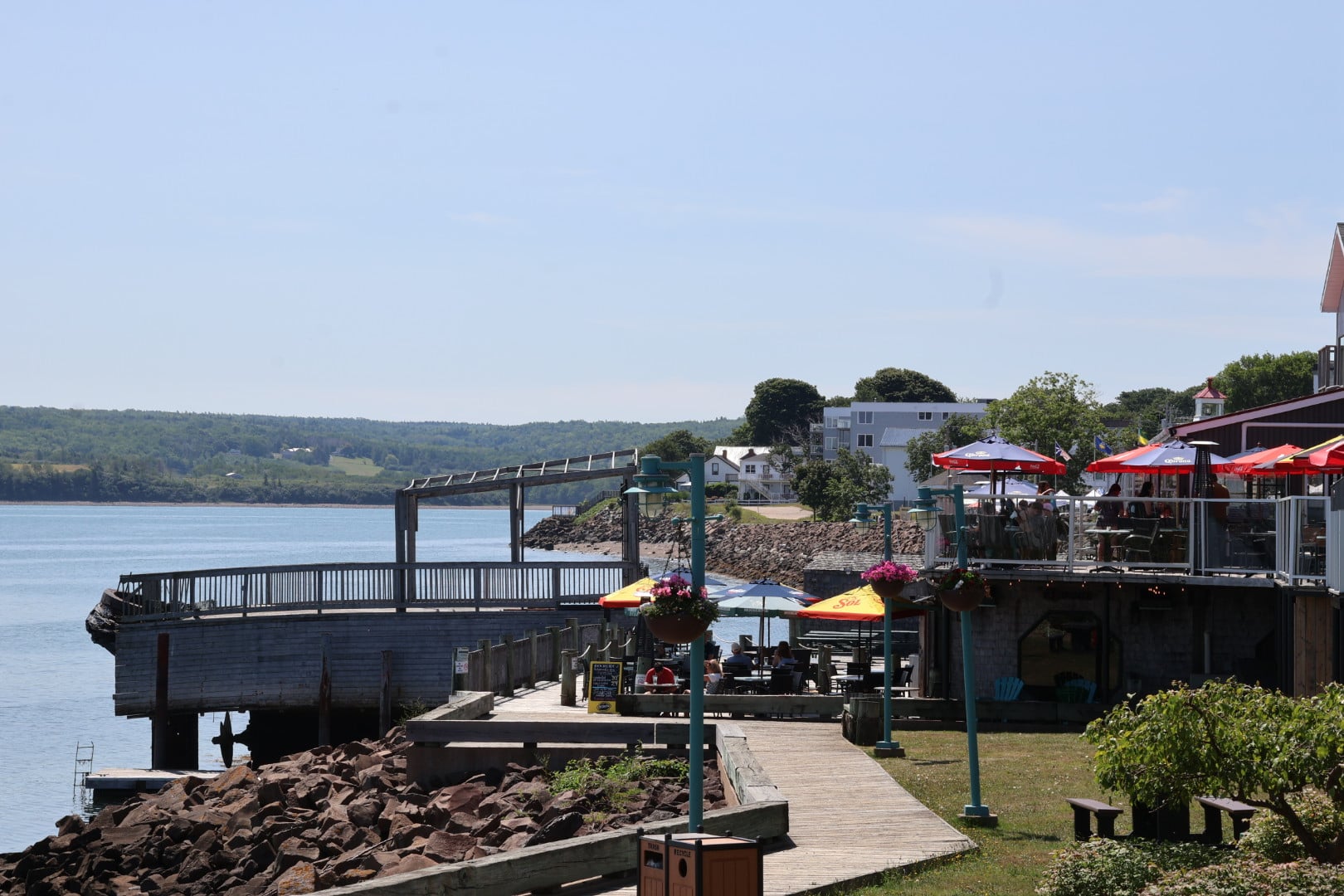 Waterfront boardwalk with a seaside restaurant in Digby, Nova Scotia