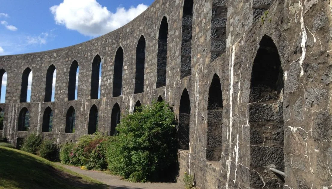 McCaig’s Tower is Circular brick arched ruin in Oban Scotland. The stone is a grey granite type.