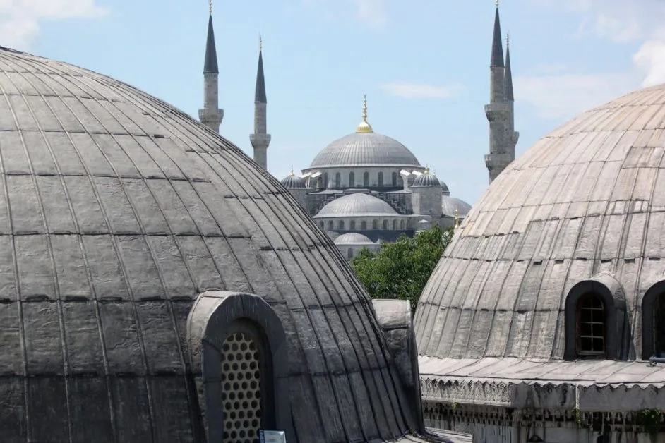 Mosques in central Istanbul with grey domed roofs and minarets.