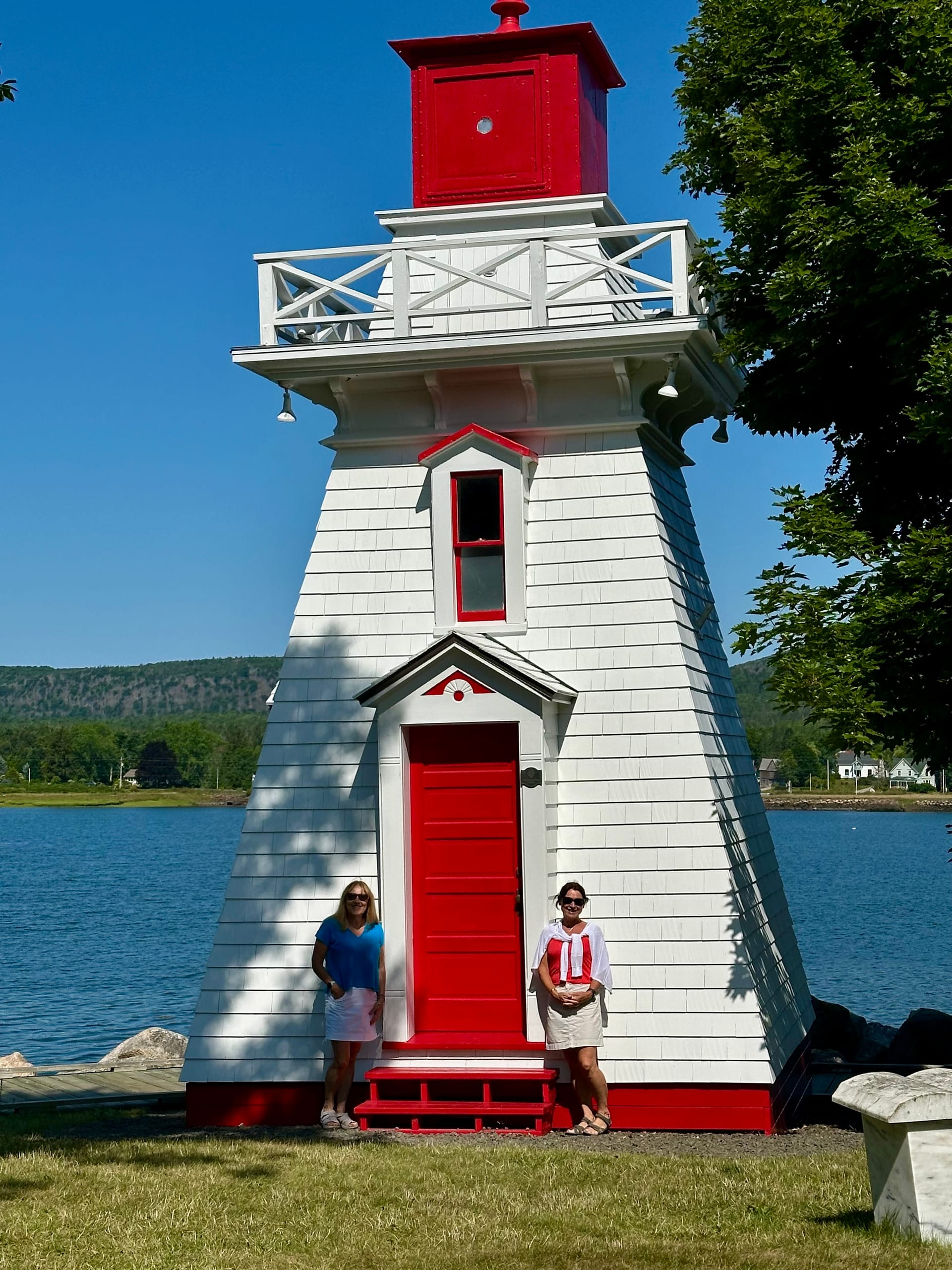 White and red lighthouse on the waterfront at Annapolis Royal