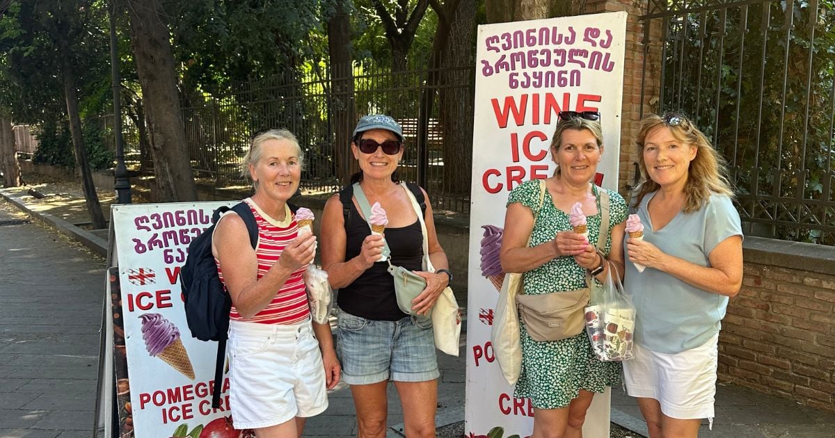 Women holding ice cream cones