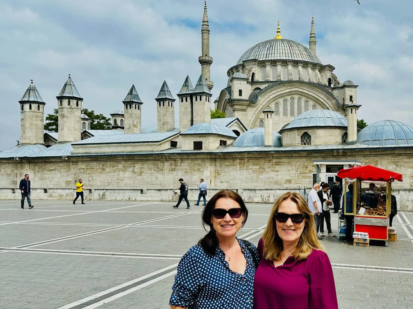 Women in a mosque courtyard