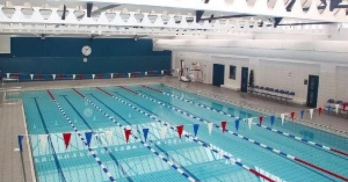 A swimming pool with lane markings.