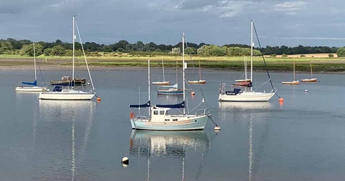 Several sail boats on River Deben in Woodbridge which are for hire.