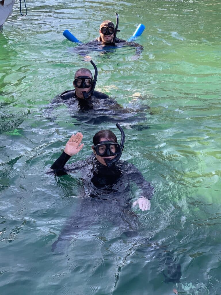 People in wetsuits in a spring in Florida.