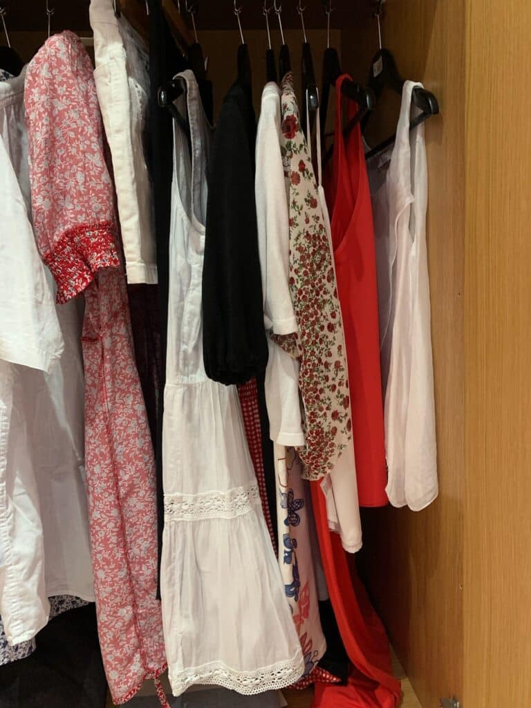 Photos show clothing brought in hand luggage as part of a post called 10kg allowance and no fees.