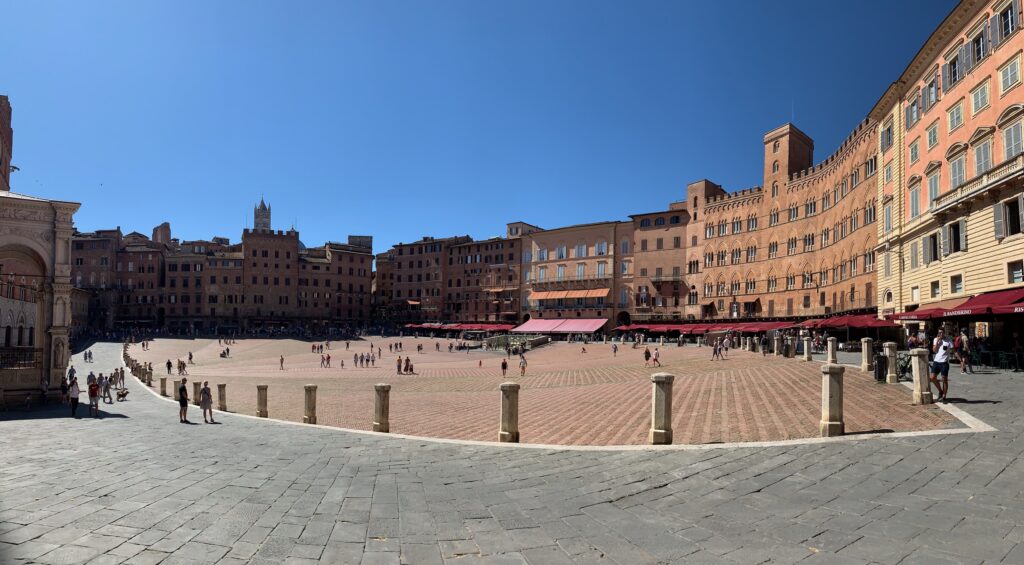 Large square in Siena which is curved as it was designed for horse races.