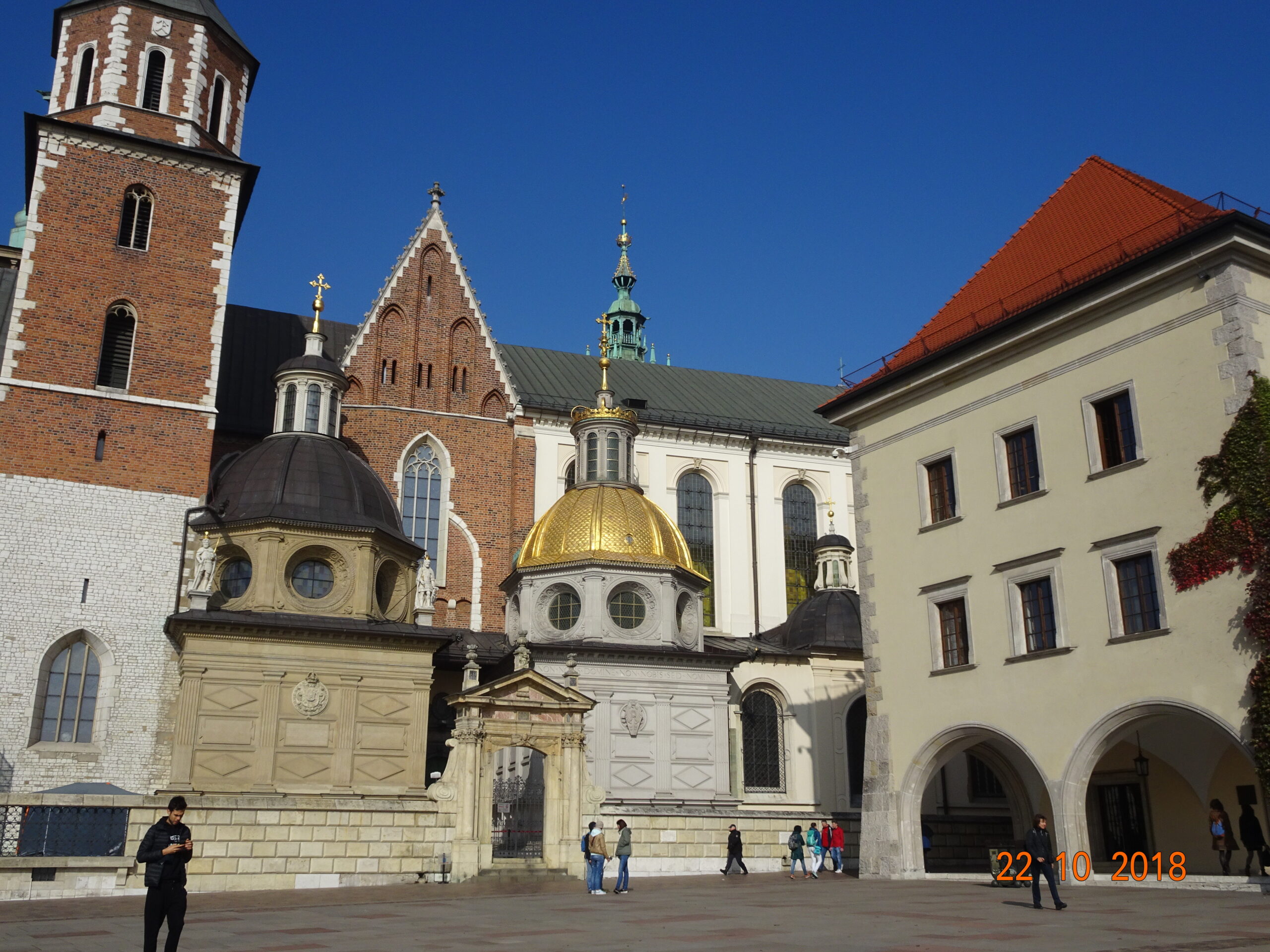 Krakow skyline illustrates one of 4 fabulous second cities to visit. Medieval buildings and spires fill the sky.