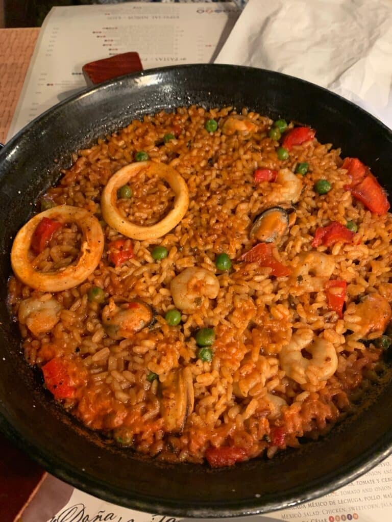 A cast iron dish with traditional Spanish Paella.