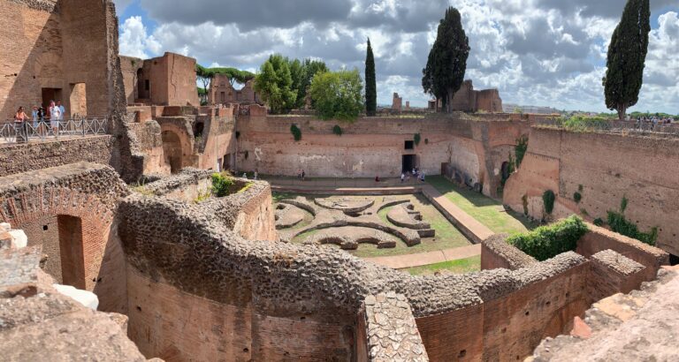Excavated ruins reveal centuries old living quarters of Ancient Rome. It is possible to see the outline of areas for different activities within a city structure.