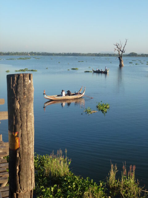 Fishing boats on a river in Myanmar.