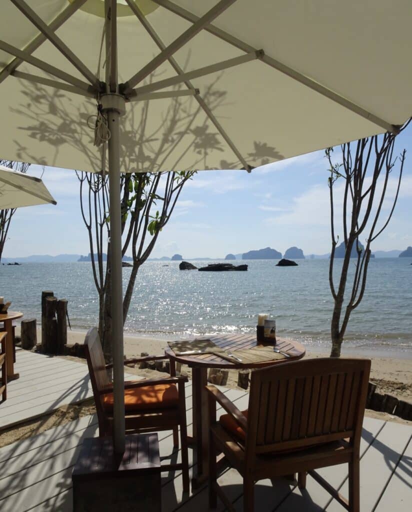 Restaurant on a beach in Krabi with views out over the ocean.