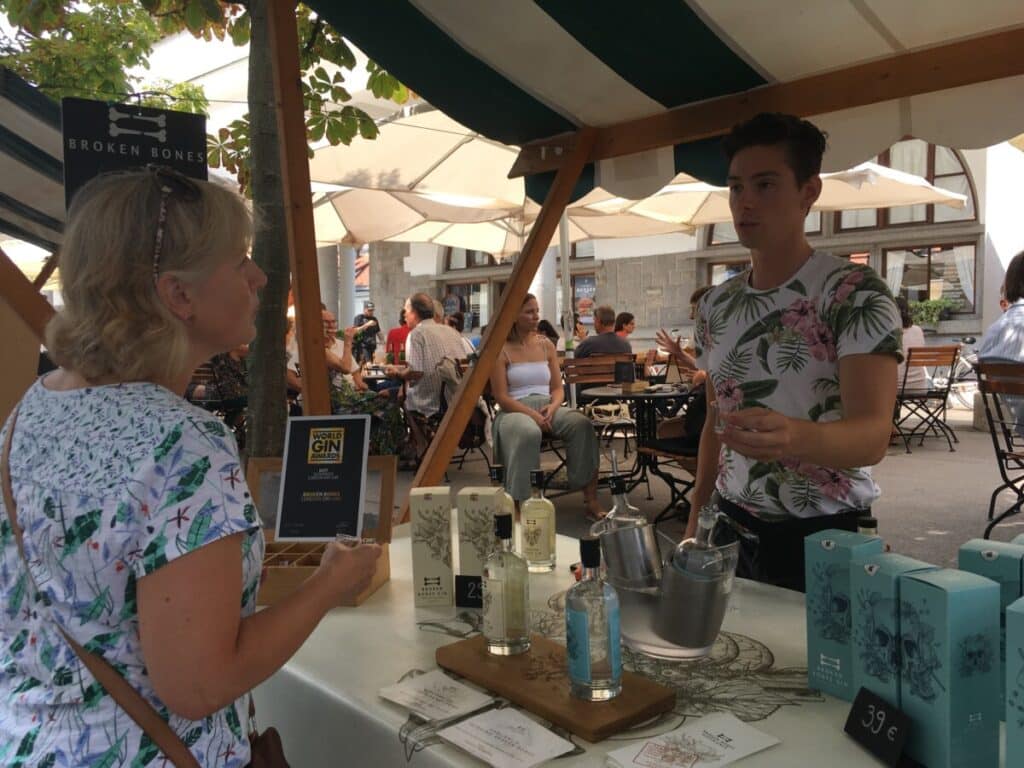 Woman is tasting a gin in Slovenia