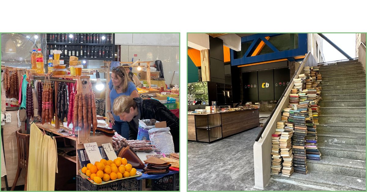 A market stall in Green Bazaar Kutaisi with fruit and local candies for sale. Next door is a flea market style book store.