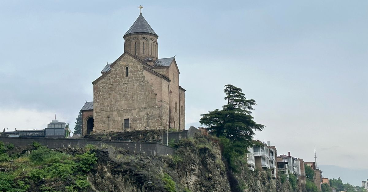 A church built of stone in Georgian style on top of a cliff in Tbilisi Georgia.