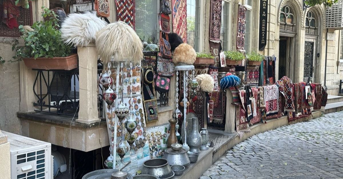 Old Town Baku shop which curves around a cobbled street and displays local handicrafts.