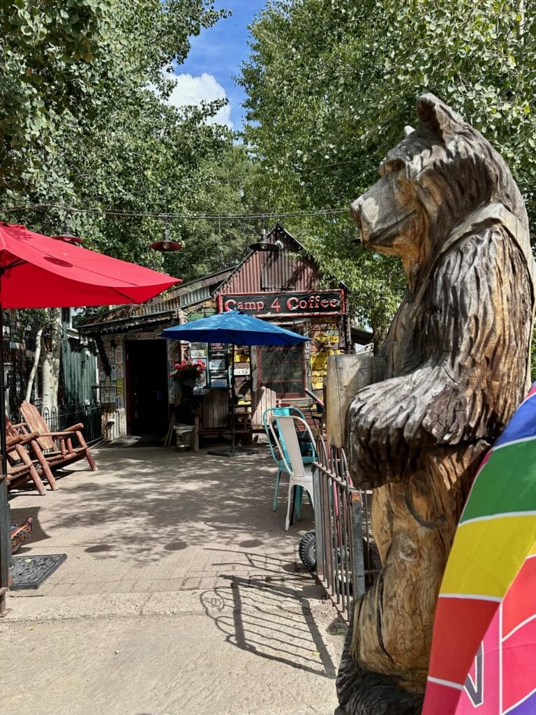 Camp 4 Coffee has operated in Crested Butte, Colorado for over 24 years and is a wooden original building, with a carved Bear standing guard.