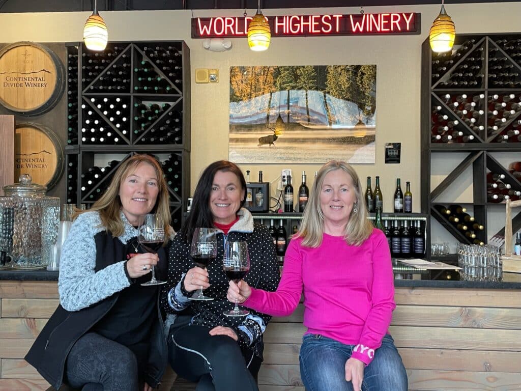 Sisters in Breckenridge sampling Colorado wines from Palisade grapes.