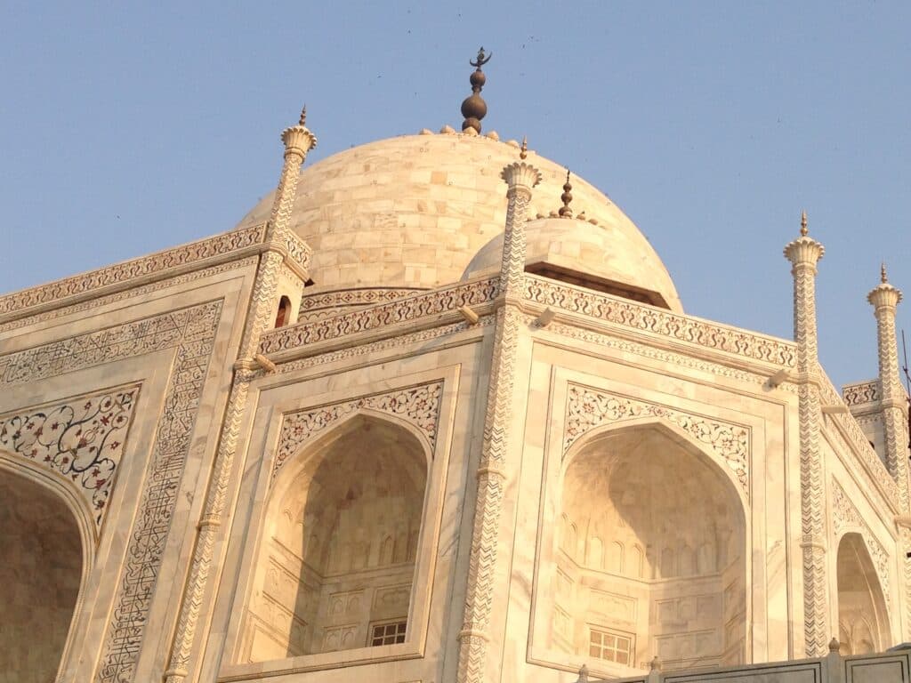 Taj Malah in India's Golden Triangle is a white marble tomb. It is highly decorated with inlays of precious stones.